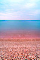Standing looking out to sea