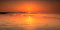 Deserted beach sunrise