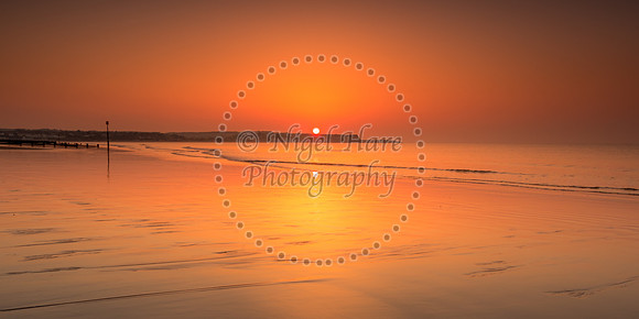 Deserted beach sunrise